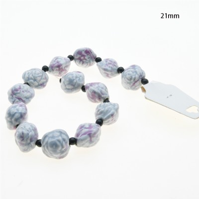 CERAMICA FORMA DE FLOR 21MM