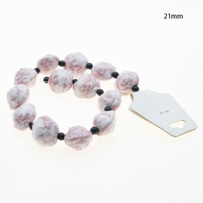 CERAMICA FORMA DE FLOR 21MM