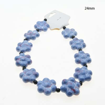 CERAMICA FORMA DE FLOR 24MM