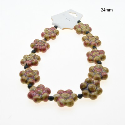 CERAMICA FORMA DE FLOR 24MM