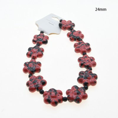 CERAMICA FORMA DE FLOR 24MM