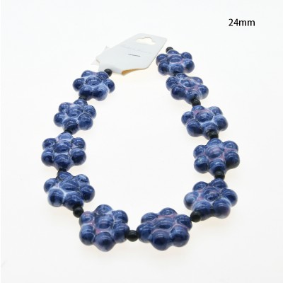 CERAMICA FORMA DE FLOR 24MM