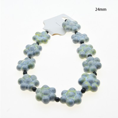 CERAMICA FORMA DE FLOR 24MM