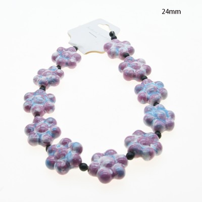 CERAMICA FORMA DE FLOR 24MM