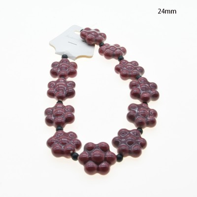 CERAMICA FORMA DE FLOR 24MM