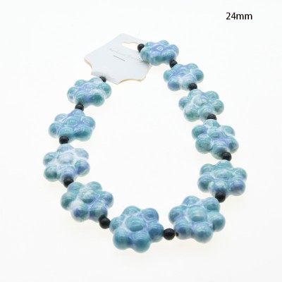 CERAMICA FORMA DE FLOR 24MM