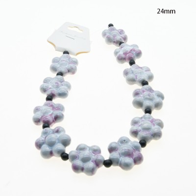 CERAMICA FORMA DE FLOR 24MM